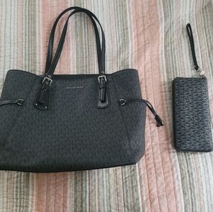 Black large Michael Kors purse and wallet